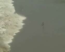 man-engulfed-in-wave-khao-lak.jpg